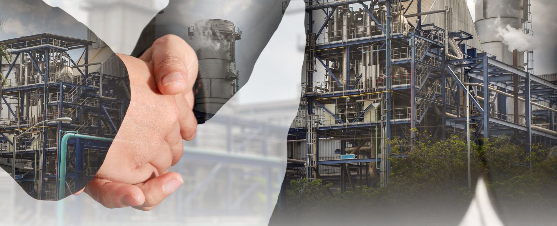 A handshake over an industrial site